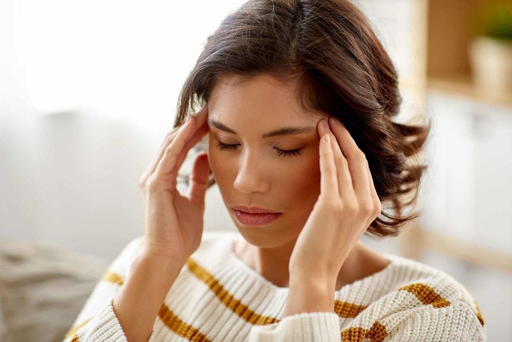 unhappy woman suffering from mental fatigue stress at home