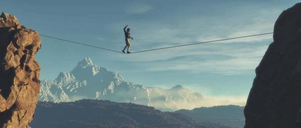 Young man walking in balance on the rope over the mountains. This is a 3d render illustration